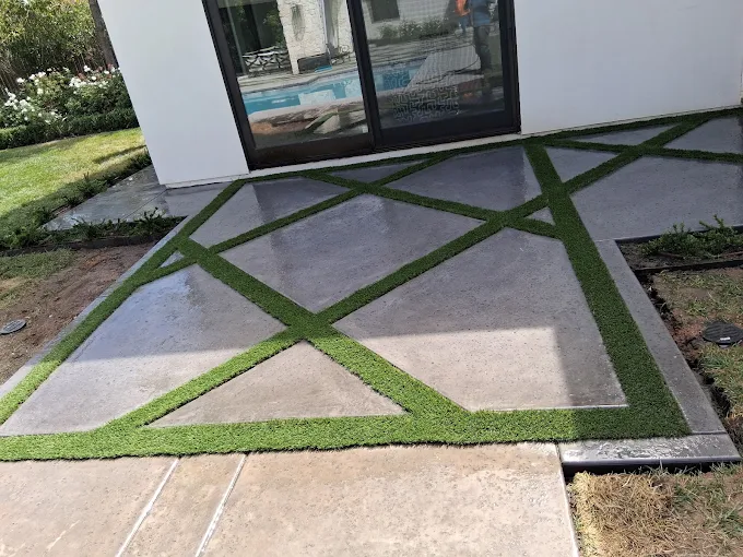 concrete and artificial grass